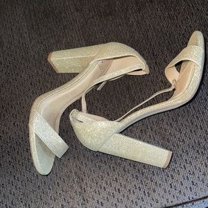 Gold platform heel shoes. Worn once